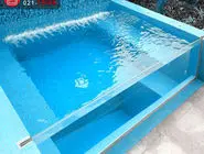 تحول در طراحی استخرهای خانگی با استفاده از دیوار شیشه‌ای استخر