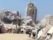 لحظه حمله موشکی اشغالگران اسرائیلی به برج  «مشتهى» در غرب شهر غزه+فیلم